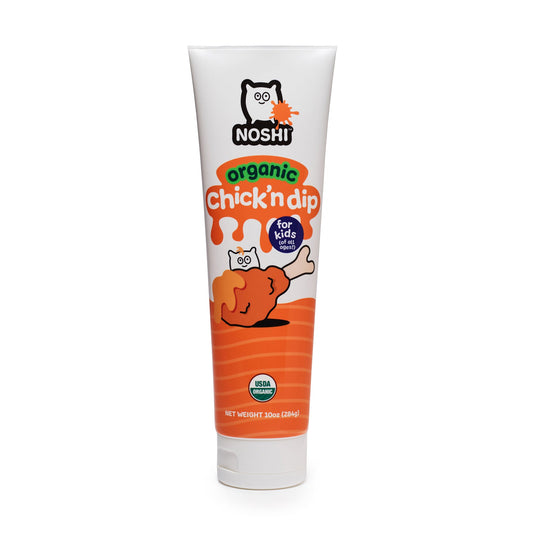 standing tube of Noshi organic Chick'n dip for kids featuring a cute round character and a chicken leg dipped in orange sauce.